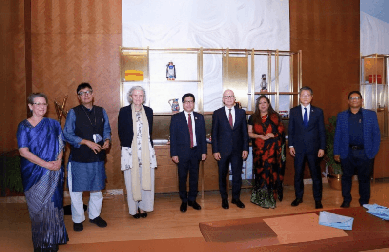 Post-Meeting Dinner on PPP Possibilities with diplomats and officials, including M. Anowar Hossain.