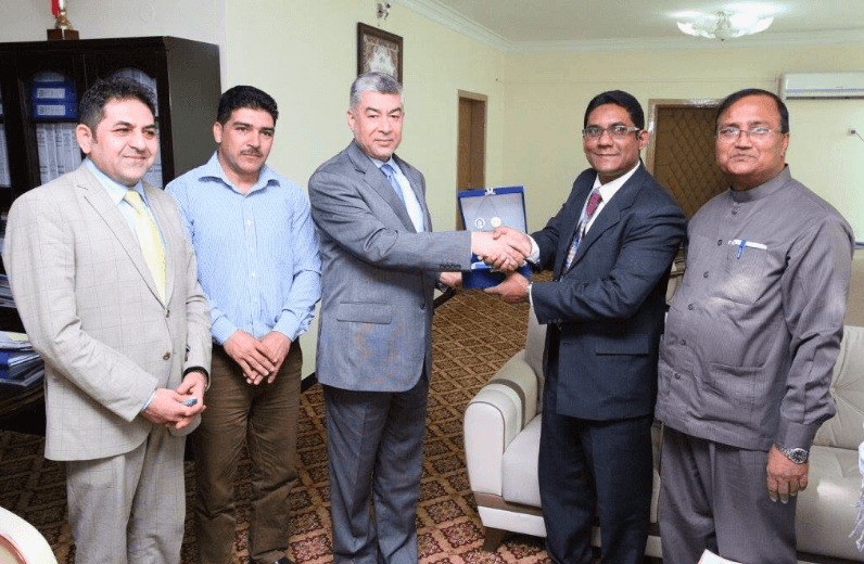 Receiving the Service of Excellence Award from Afghanistan’s Education Minister.